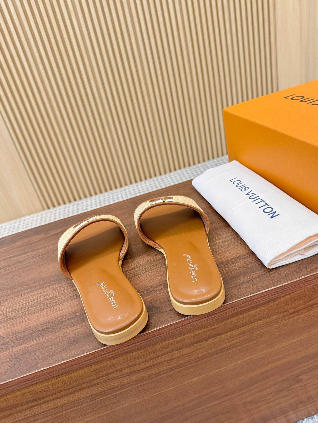 Louis Vuitton Textured Logo Slide Sandals — back