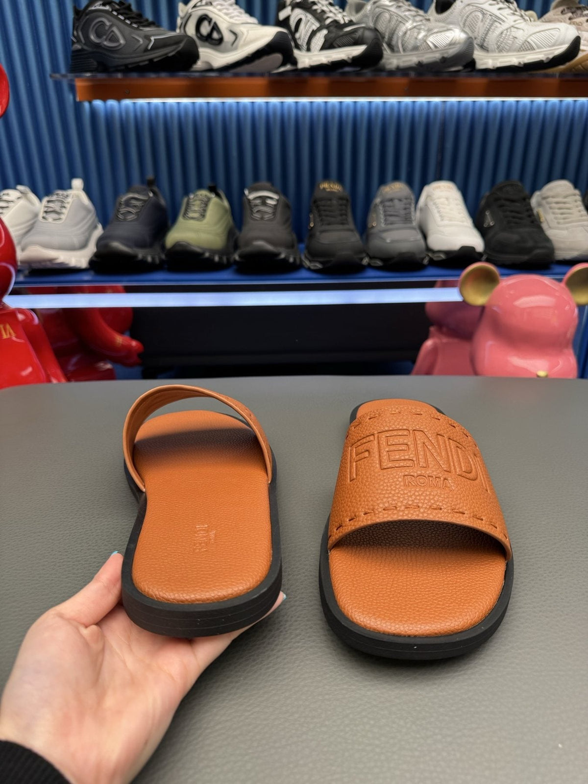 Fendi Embossed Logo Slide Sandals — side