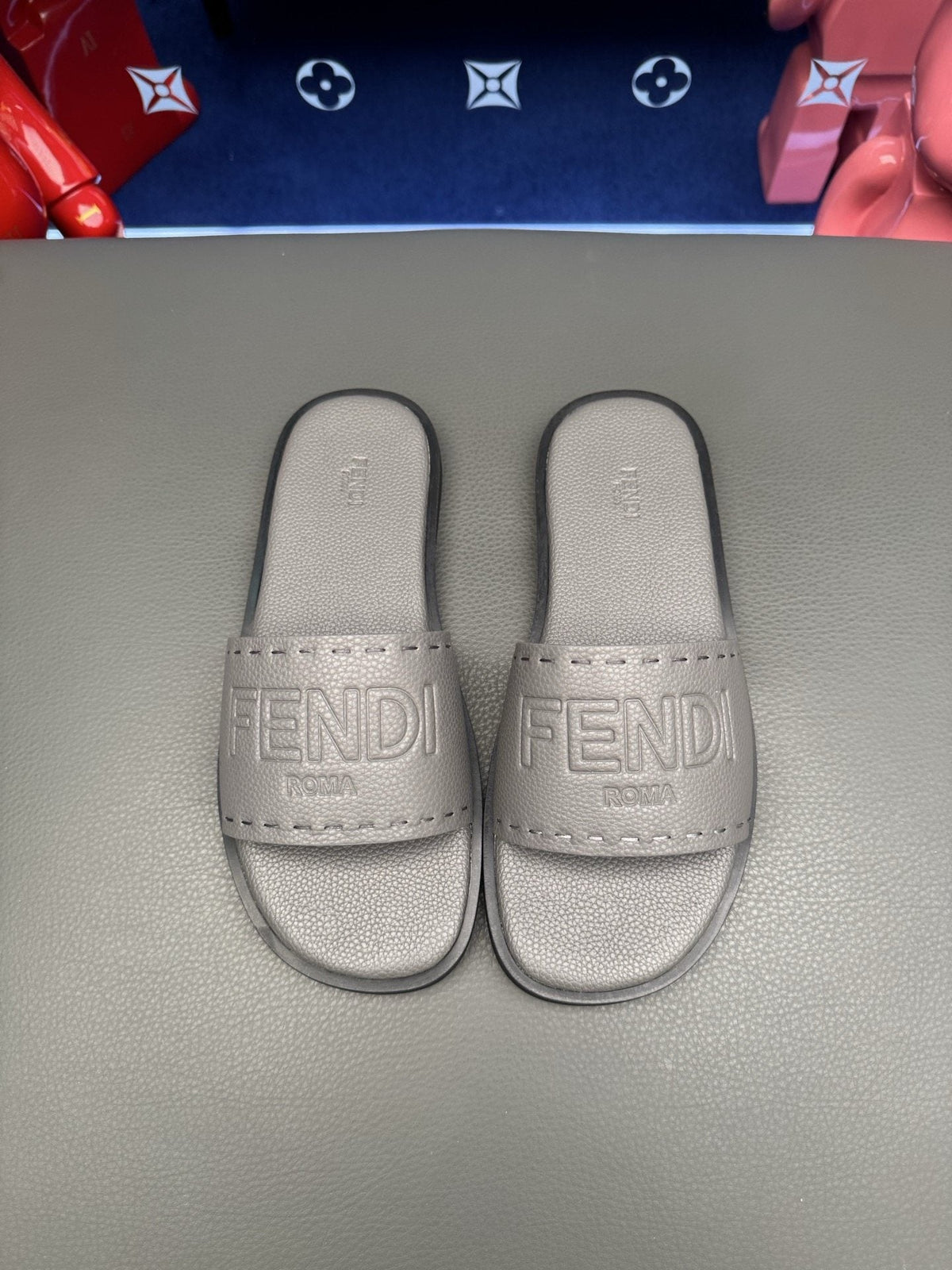 Fendi Embossed Logo Slide Sandals — hero