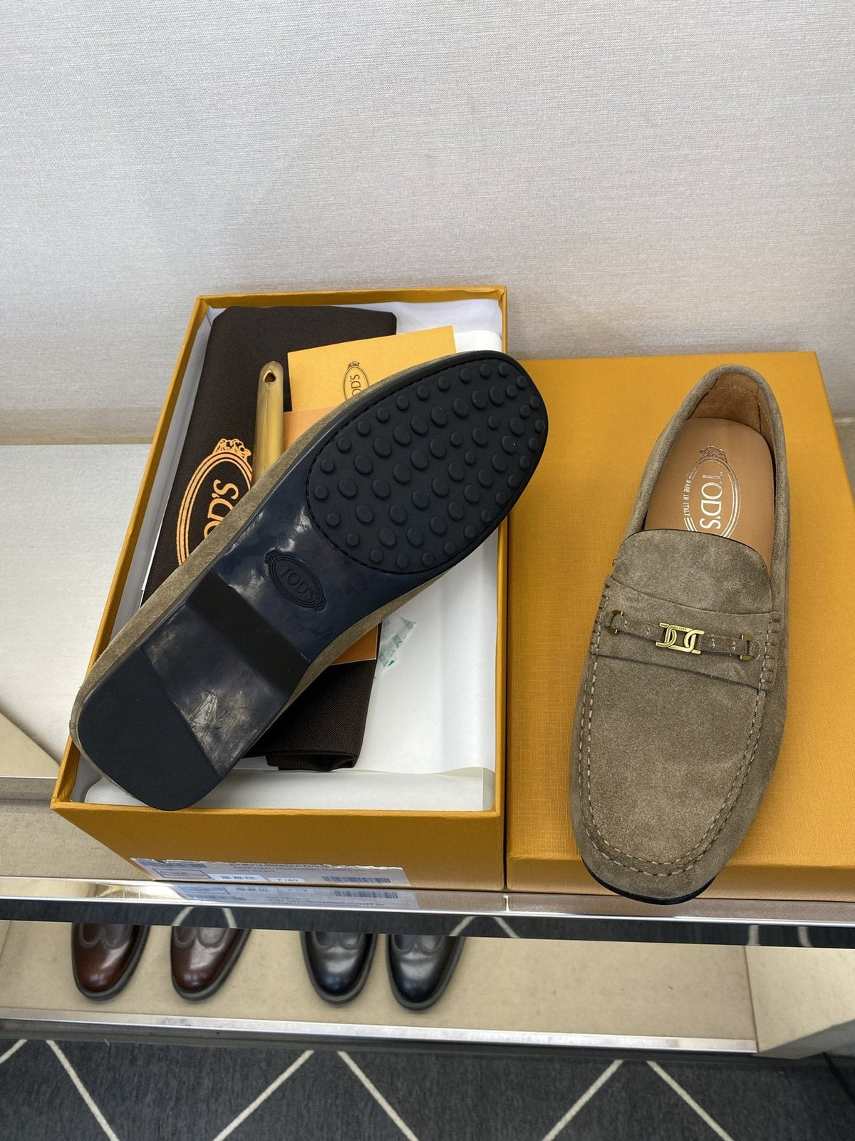Tod's Gold-Tone Hardware Loafers — side