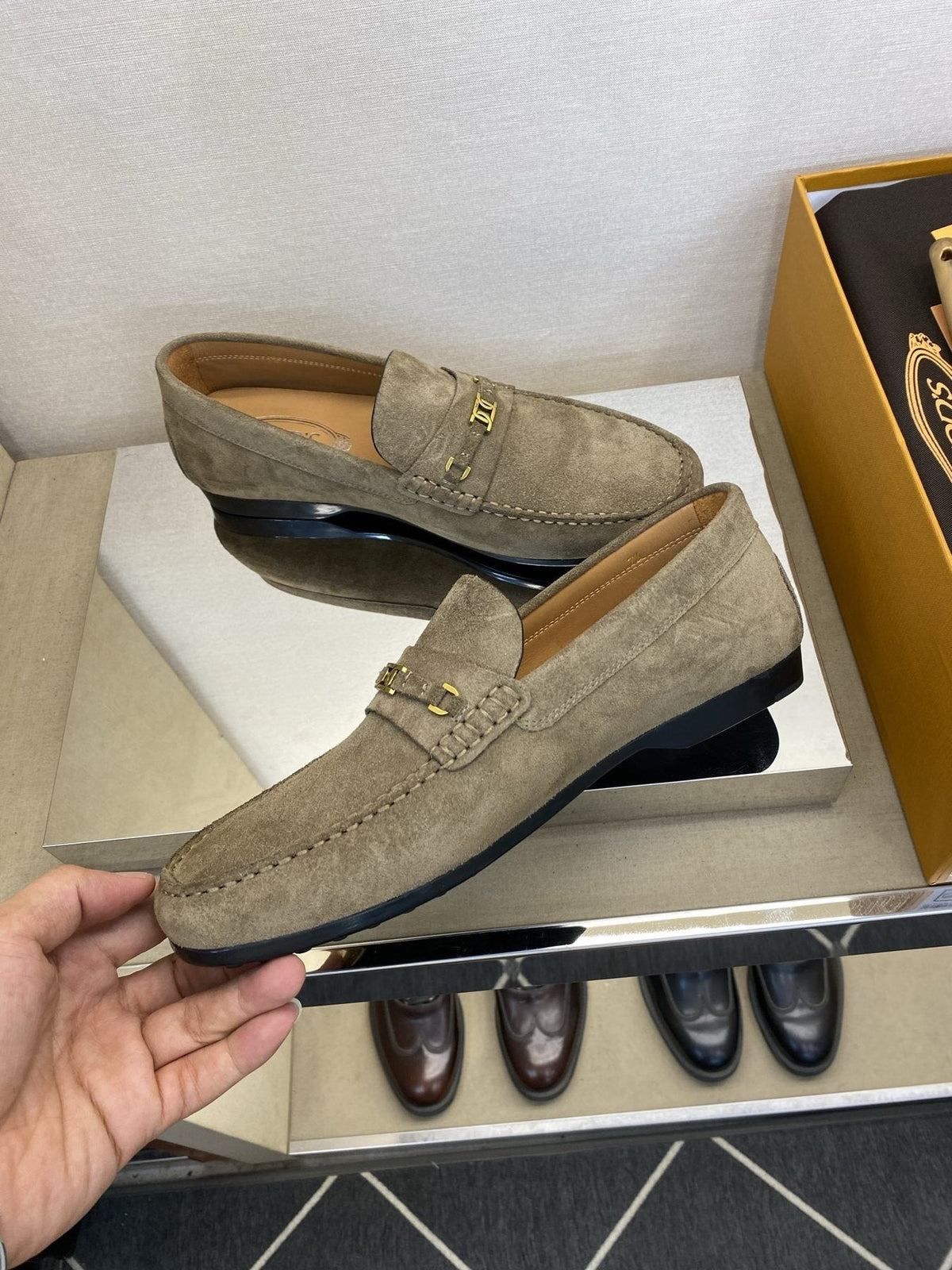 Tod's Gold-Tone Hardware Loafers — model