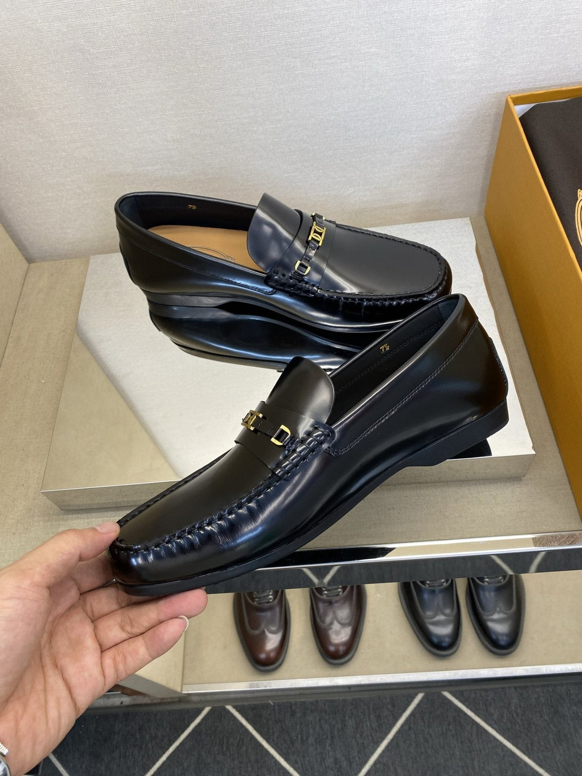 Tod's Gold-Tone Hardware Loafers — model