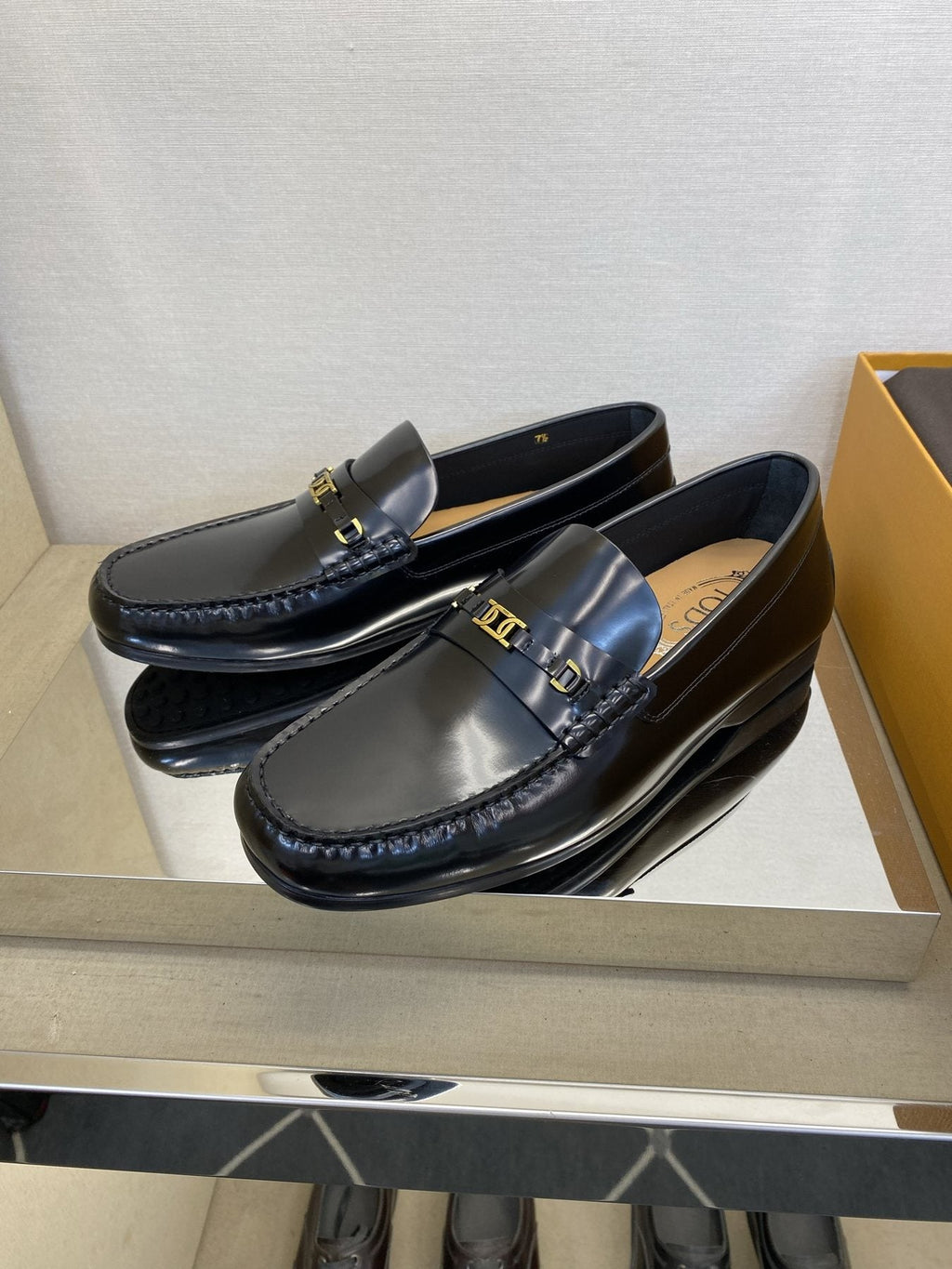 Tod's Gold-Tone Hardware Loafers — side