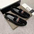 Gucci Black Web Stripe Loafers — hero