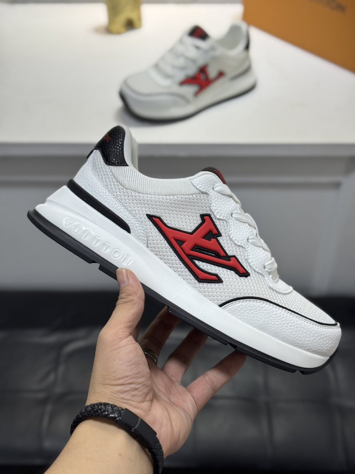 Louis Vuitton Low-Top Logo Sneakers — side