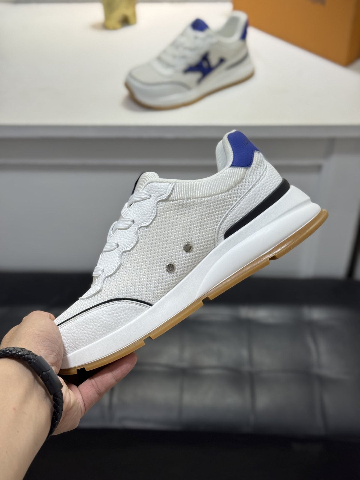 Louis Vuitton Low-Top Logo Sneakers — front