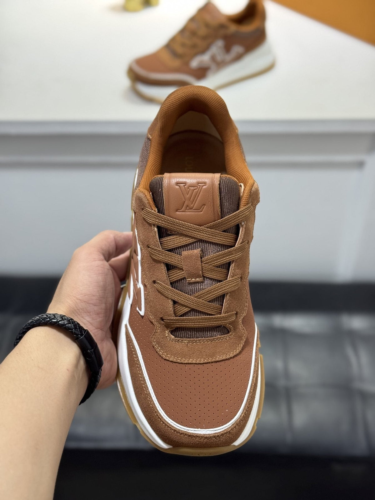 Louis Vuitton Low-Top Logo Sneakers — front