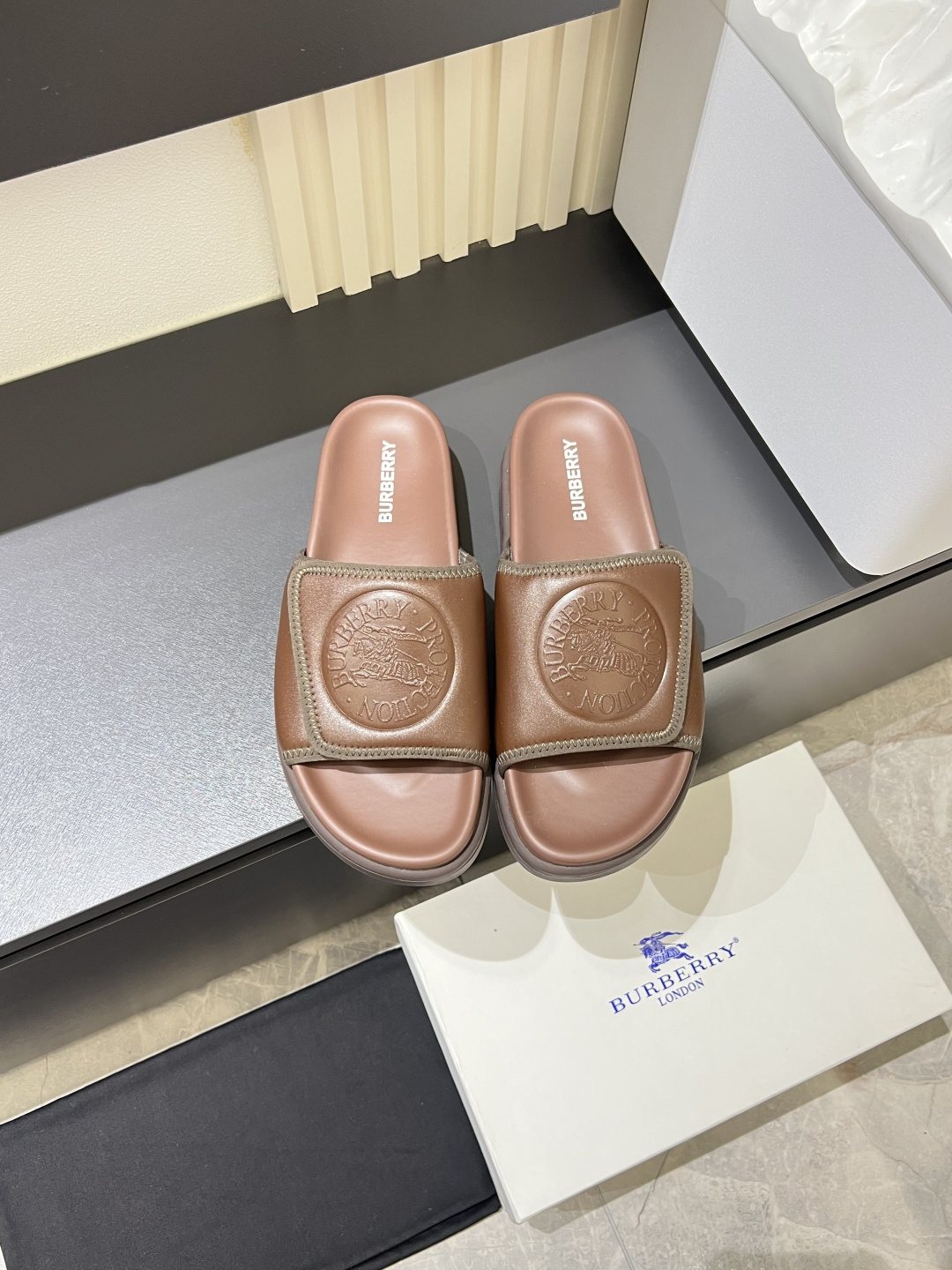 Burberry Embossed Check Slide Sandals — side