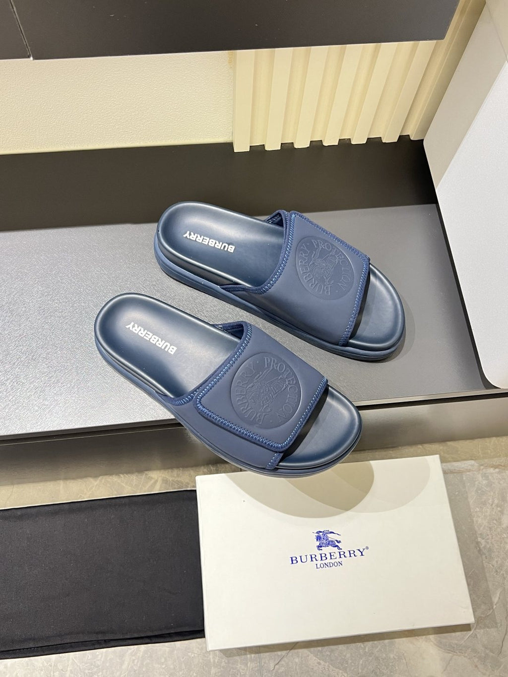 Burberry Embossed Check Slide Sandals — front