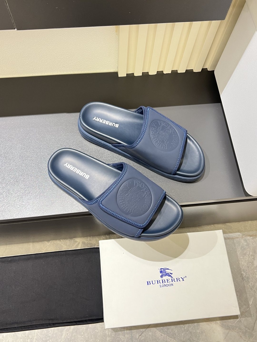 Burberry Embossed Check Slide Sandals — front