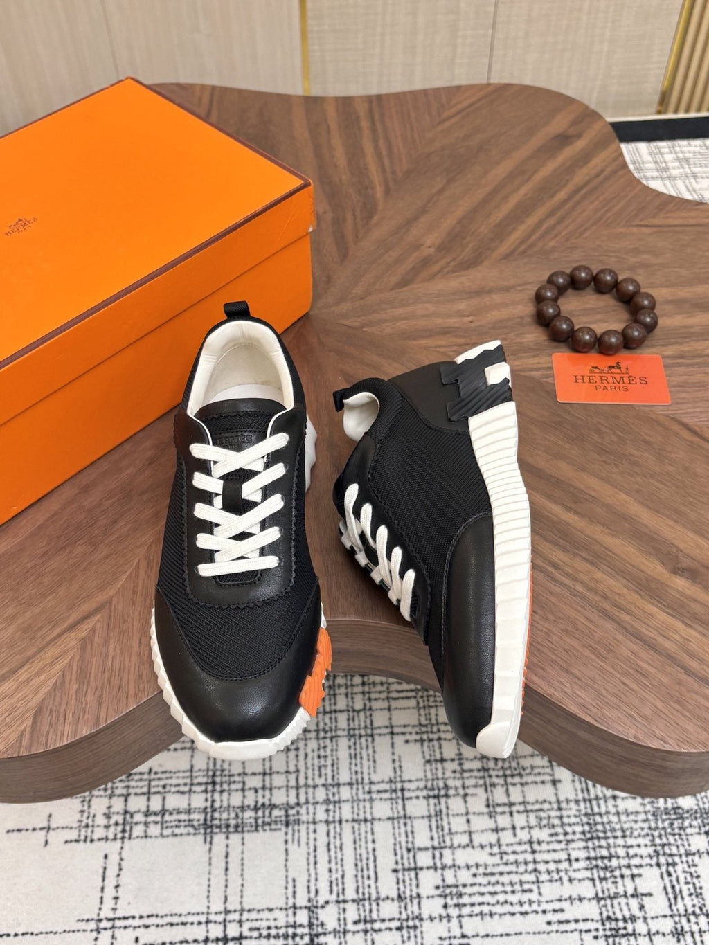 Hermes Black Ribbed Sole Sneakers — front