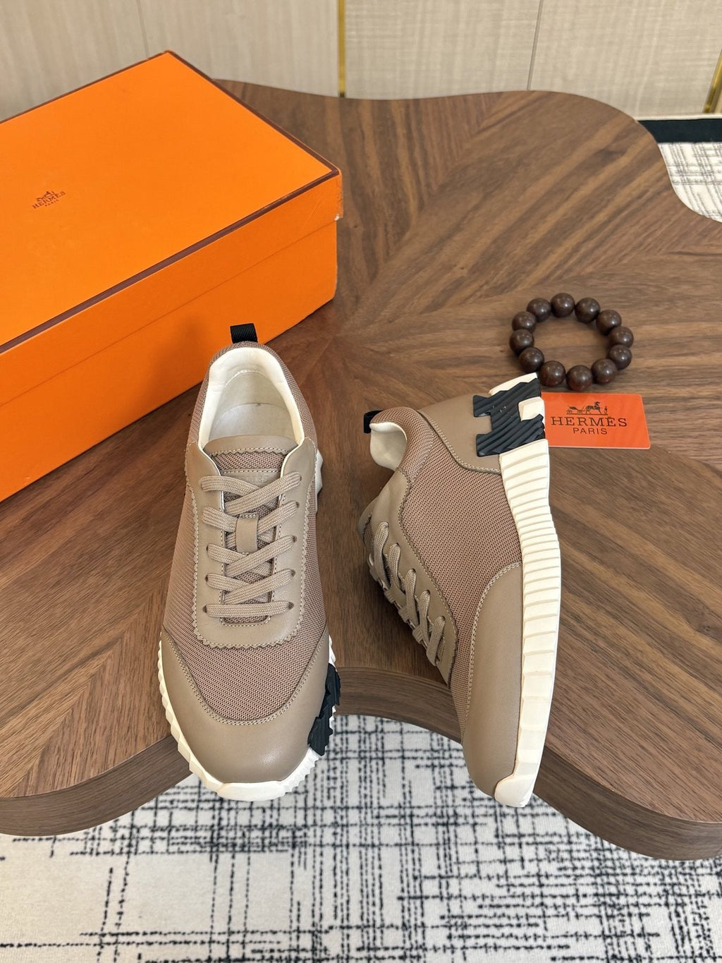 Hermes Black Ribbed Sole Sneakers — front