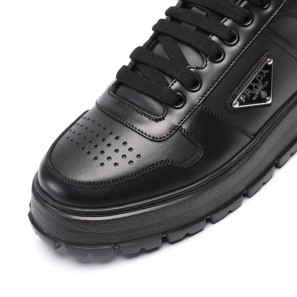 PRADA Triangle Plaque Low-Top Sneakers — detail
