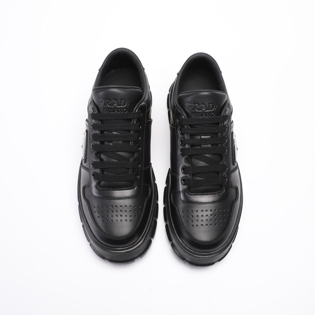 PRADA Triangle Plaque Low-Top Sneakers — front