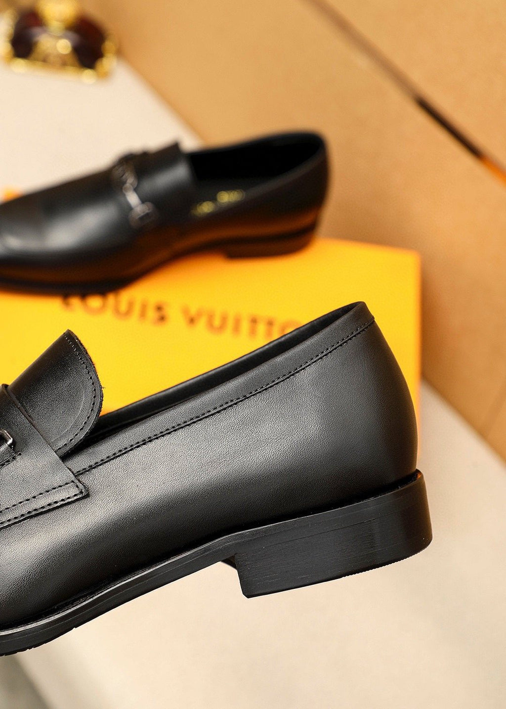 Louis Vuitton Metal-Bit Leather Loafers — detail