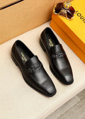 Louis Vuitton Metal-Bit Leather Loafers — hero