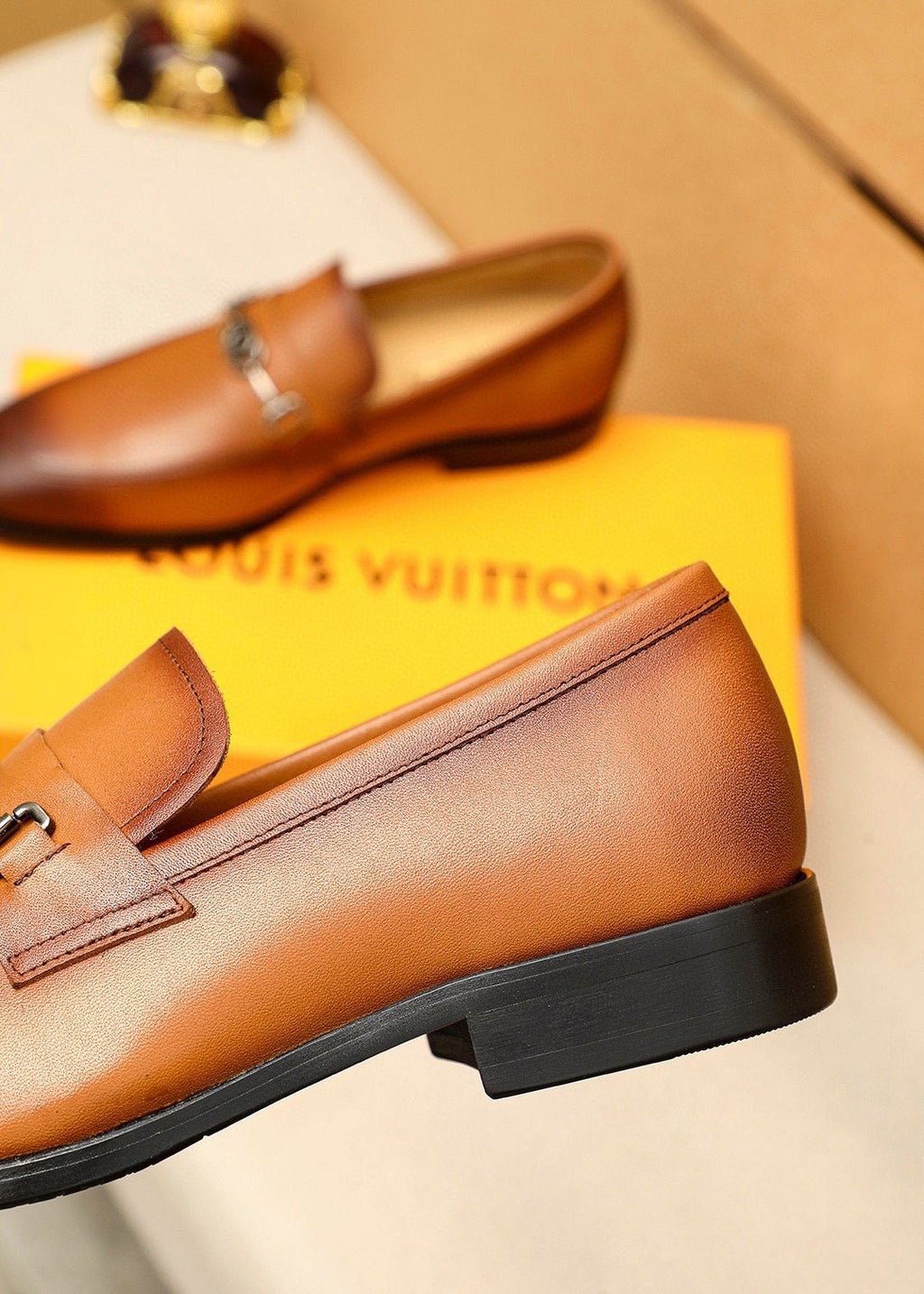 Louis Vuitton Metal-Bit Leather Loafers — detail