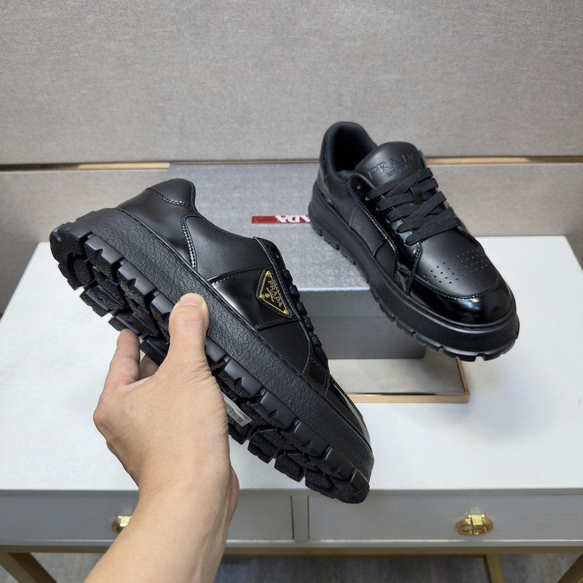 Prada Paneled Low-Top Sneakers — model