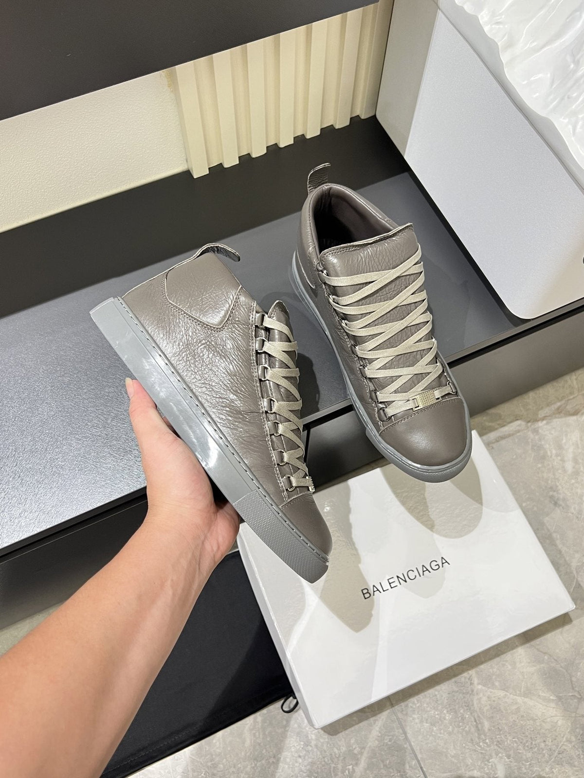 Balenciaga Lace-Up High-Top Sneakers — model