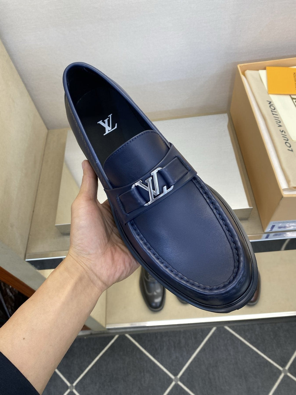 Louis Vuitton Metal Logo Loafers — front
