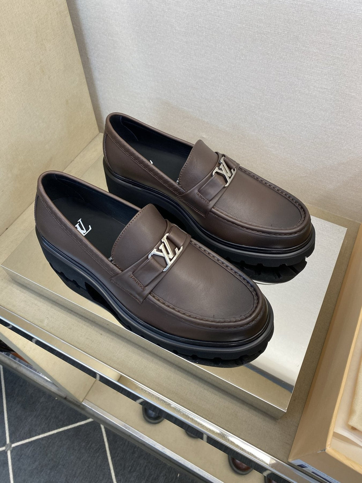 Louis Vuitton Metal Logo Loafers — front