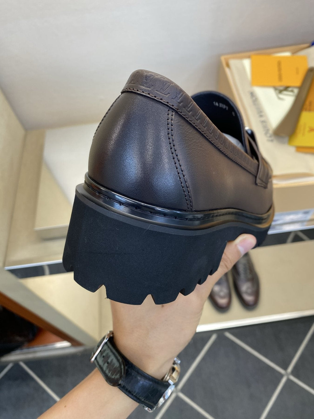 Louis Vuitton Metal Logo Loafers — detail