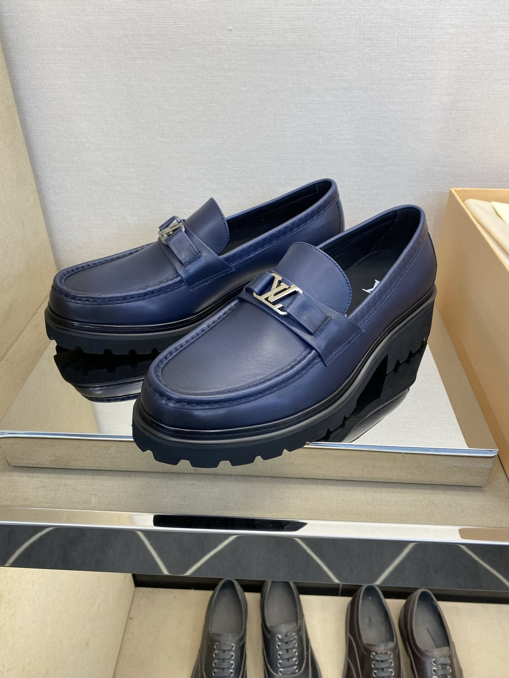 Louis Vuitton Metal Logo Loafers — side