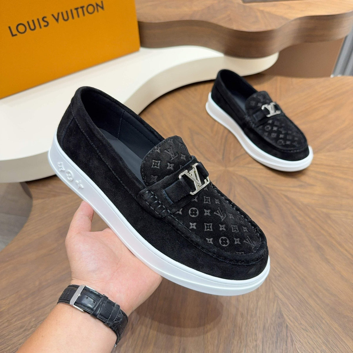 Louis Vuitton Embossed Slip-On Sneakers — model
