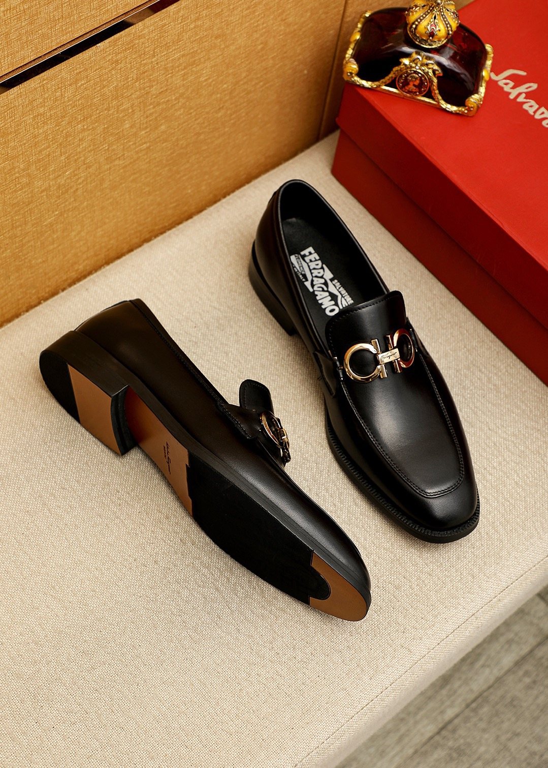 Ferragamo Black Metal Buckle Loafers — front
