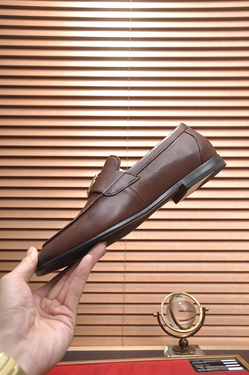 Dolce & Gabbana Leather Logo-Hardware Loafers — model