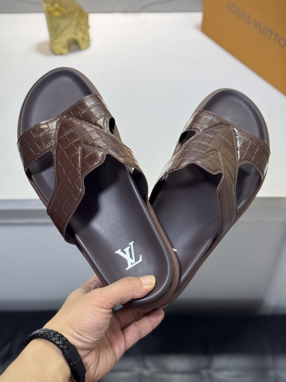 Louis Vuitton Embossed Strap Slide Sandals — model