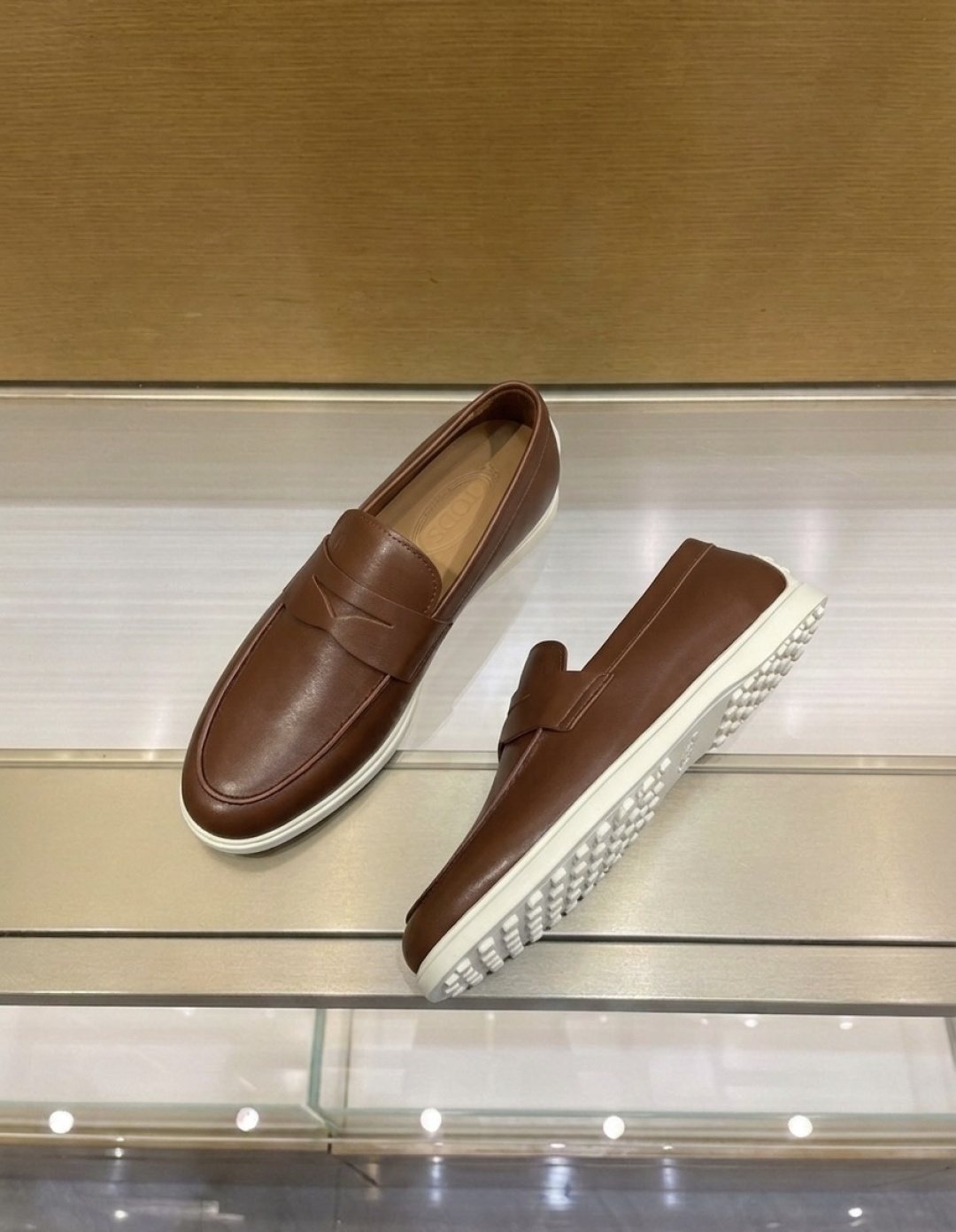 Tod's Brown Penny Loafers — side