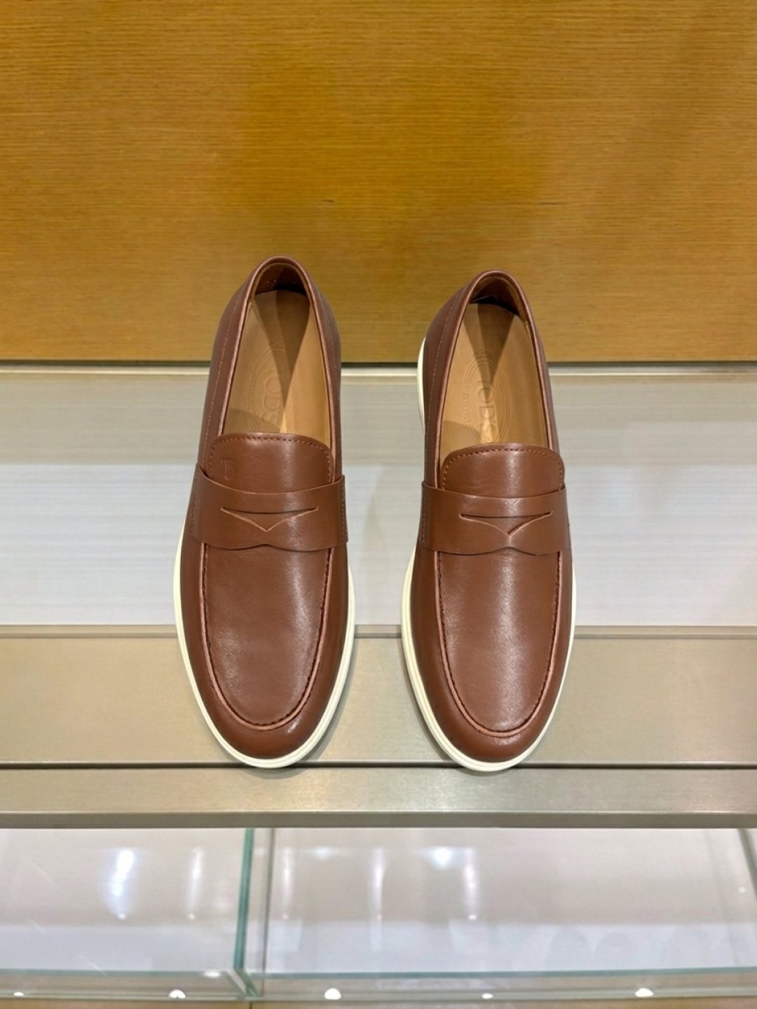 Tod's Brown Penny Loafers — front