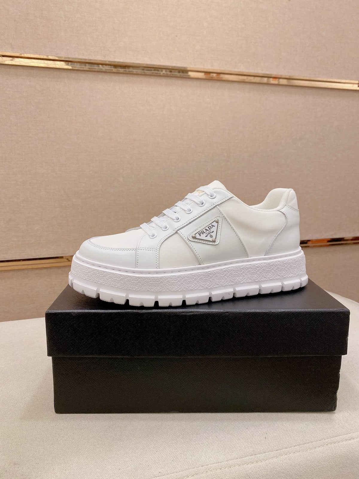 Prada Triangle Plaque Low-Top Sneakers — side