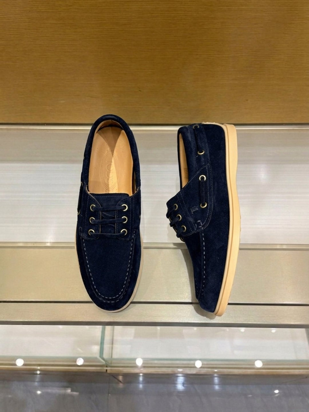 Tod's Navy Blue Boat Shoes — front