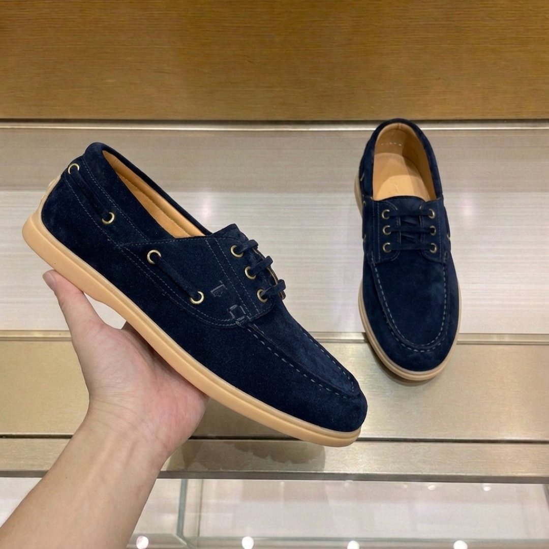 Tod's Navy Blue Boat Shoes — side