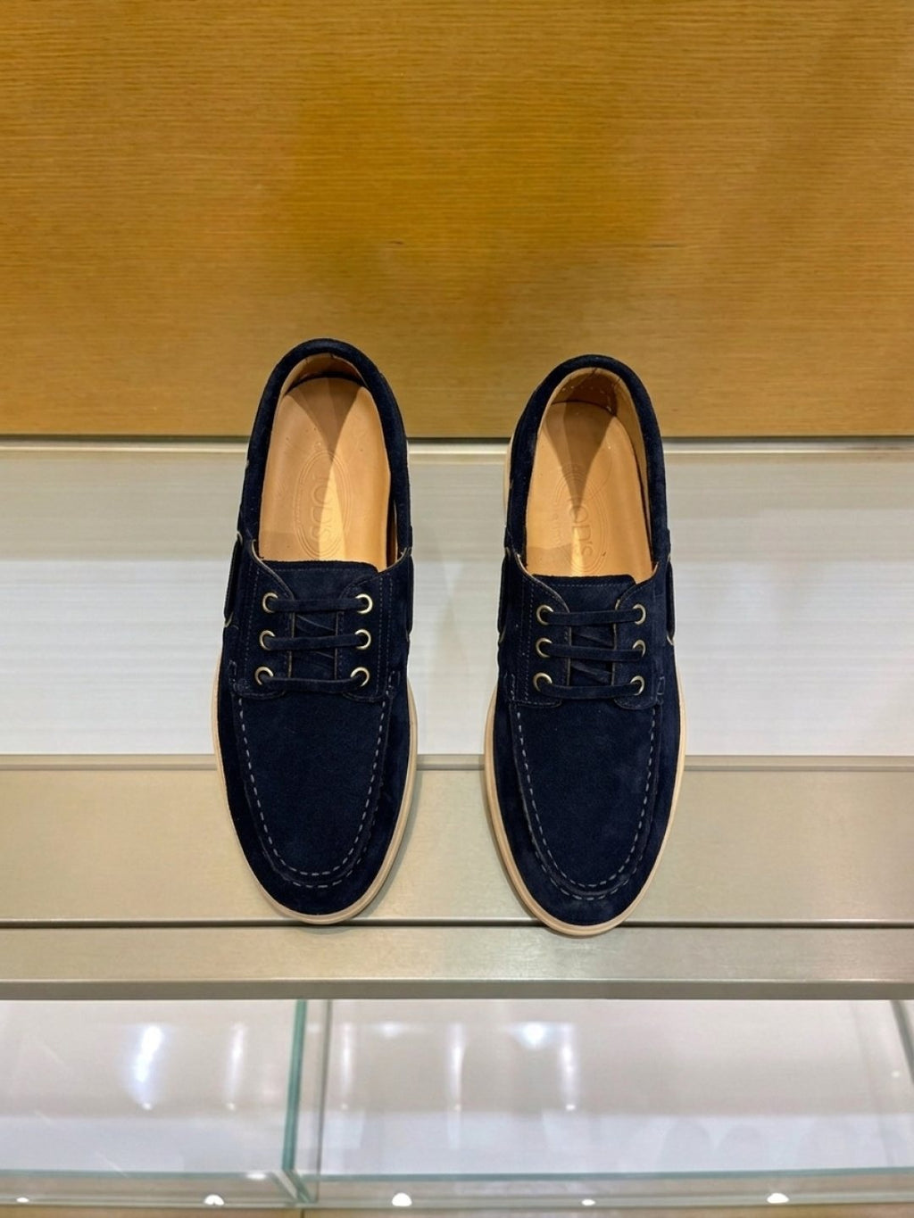Tod's Navy Blue Boat Shoes — front