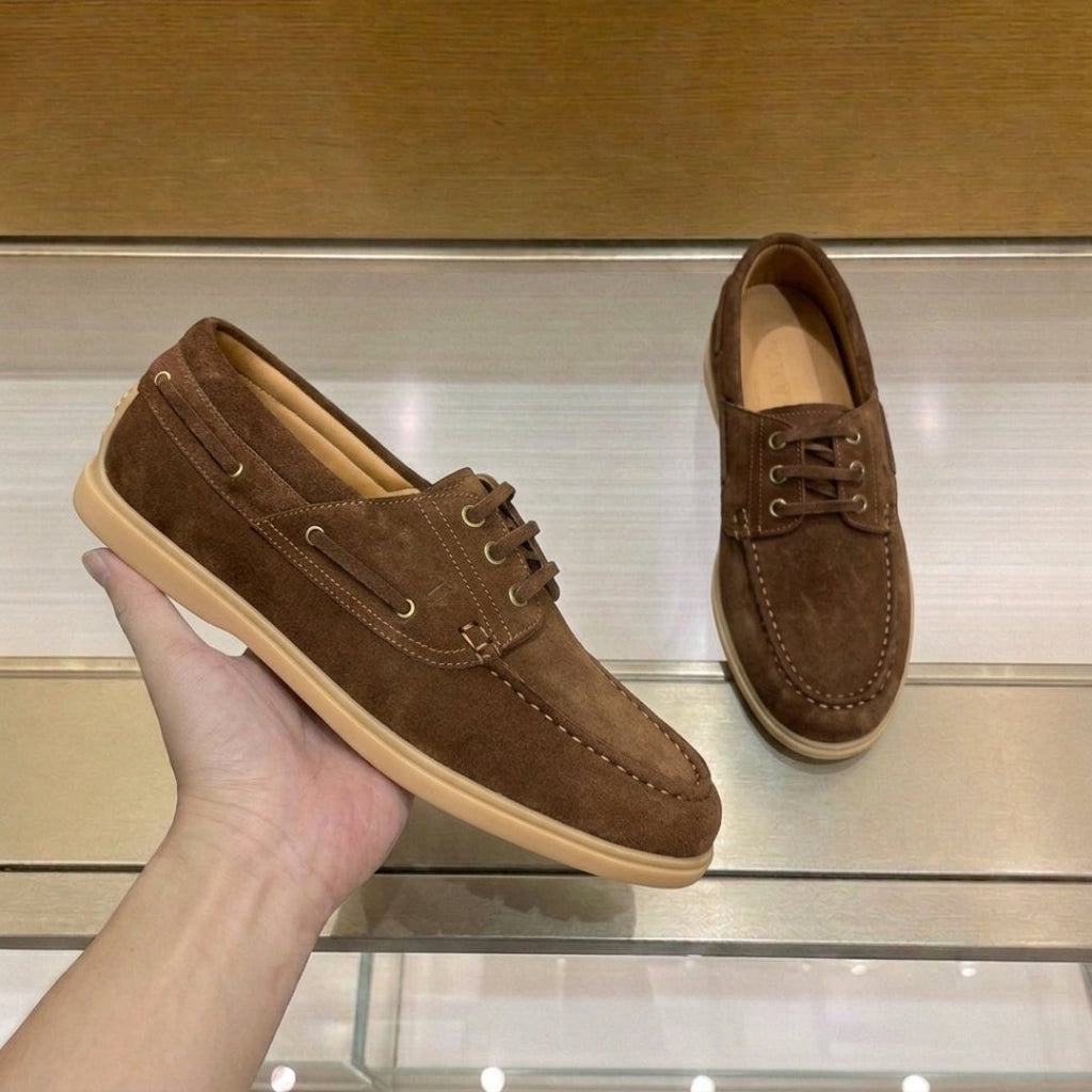 Tod's Navy Blue Boat Shoes — front