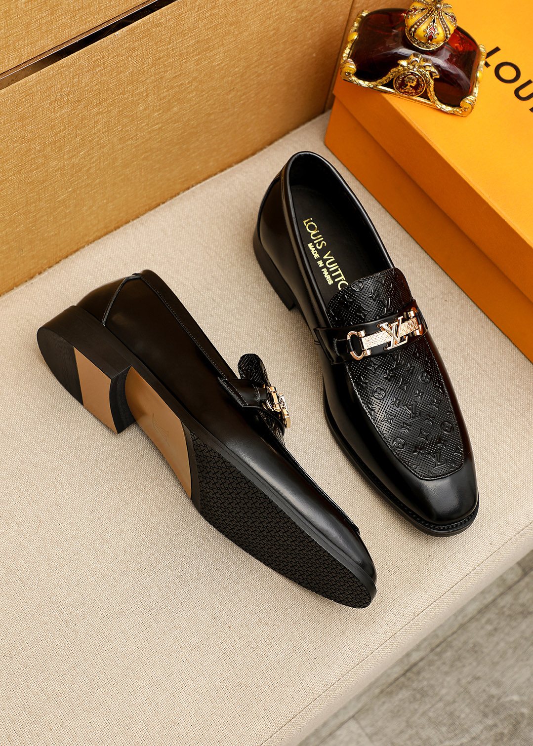 Louis Vuitton Embossed Buckle Loafers — front