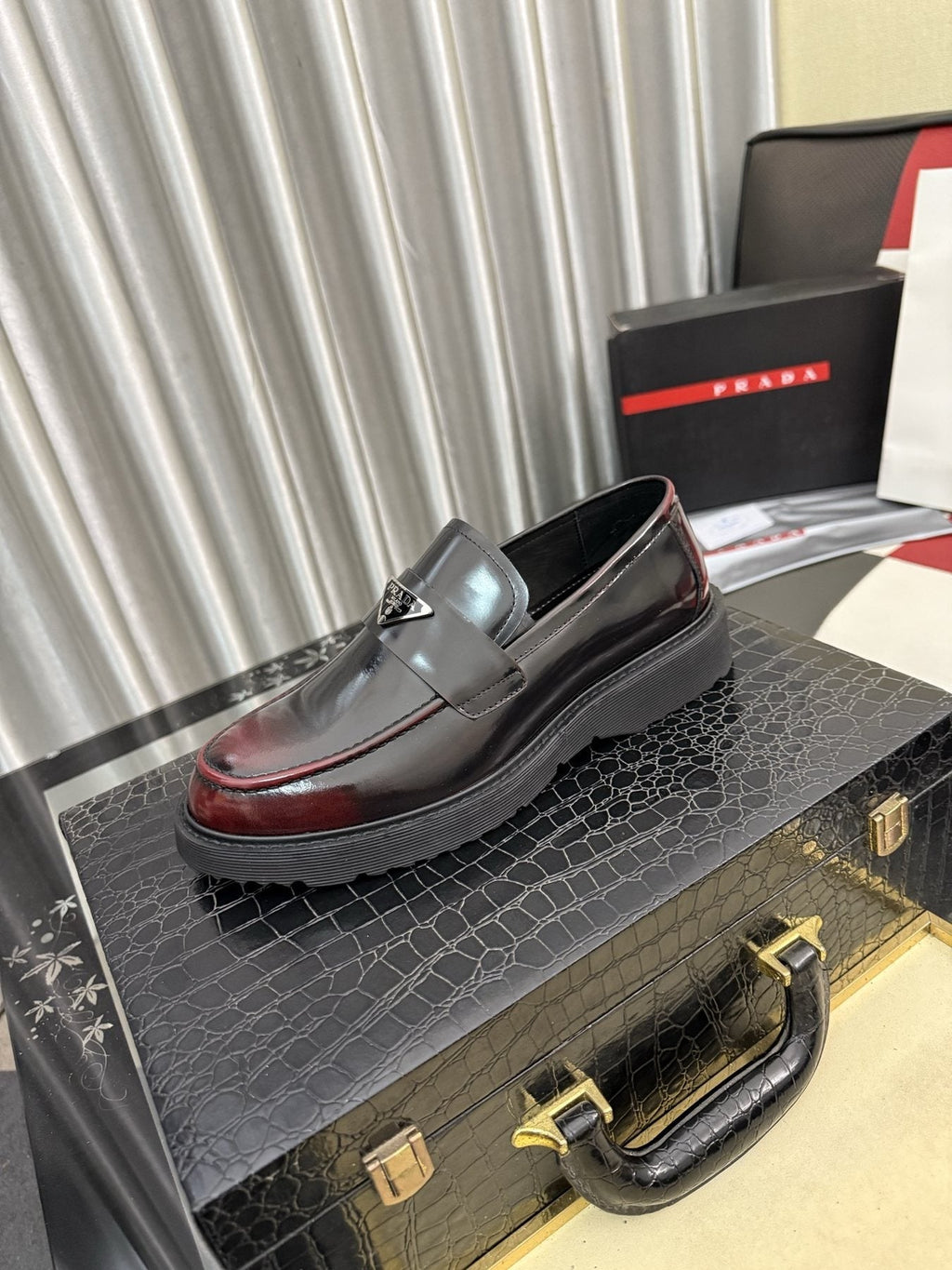Prada Triangle Plaque Loafers — front