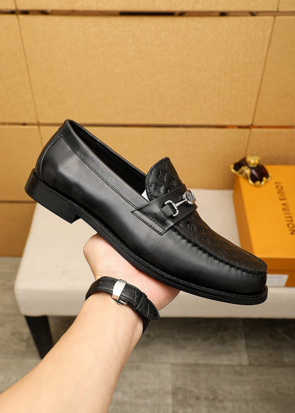 Louis Vuitton Embossed Buckle Loafers — model