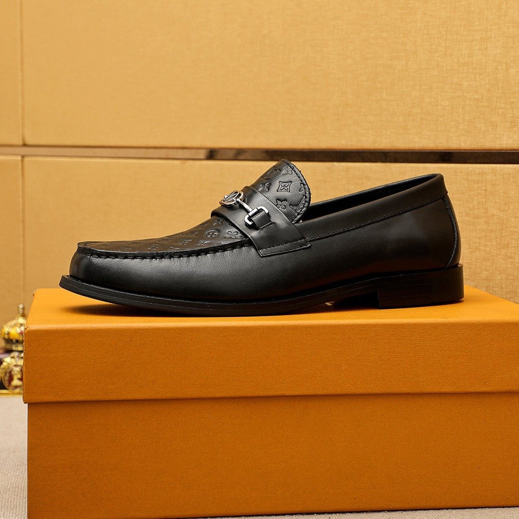 Louis Vuitton Embossed Buckle Loafers — side