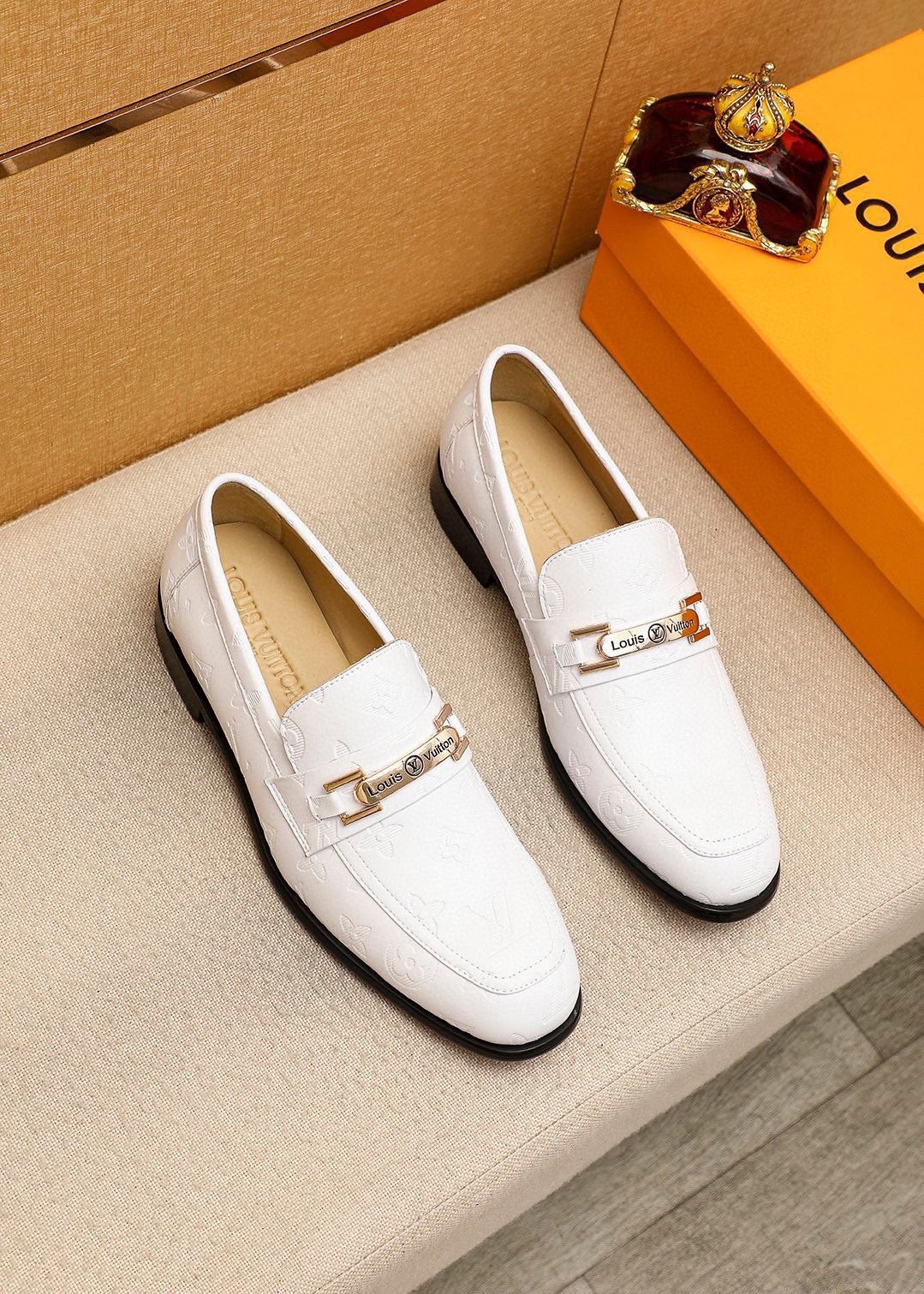 Louis Vuitton Textured Hardware Loafers — hero