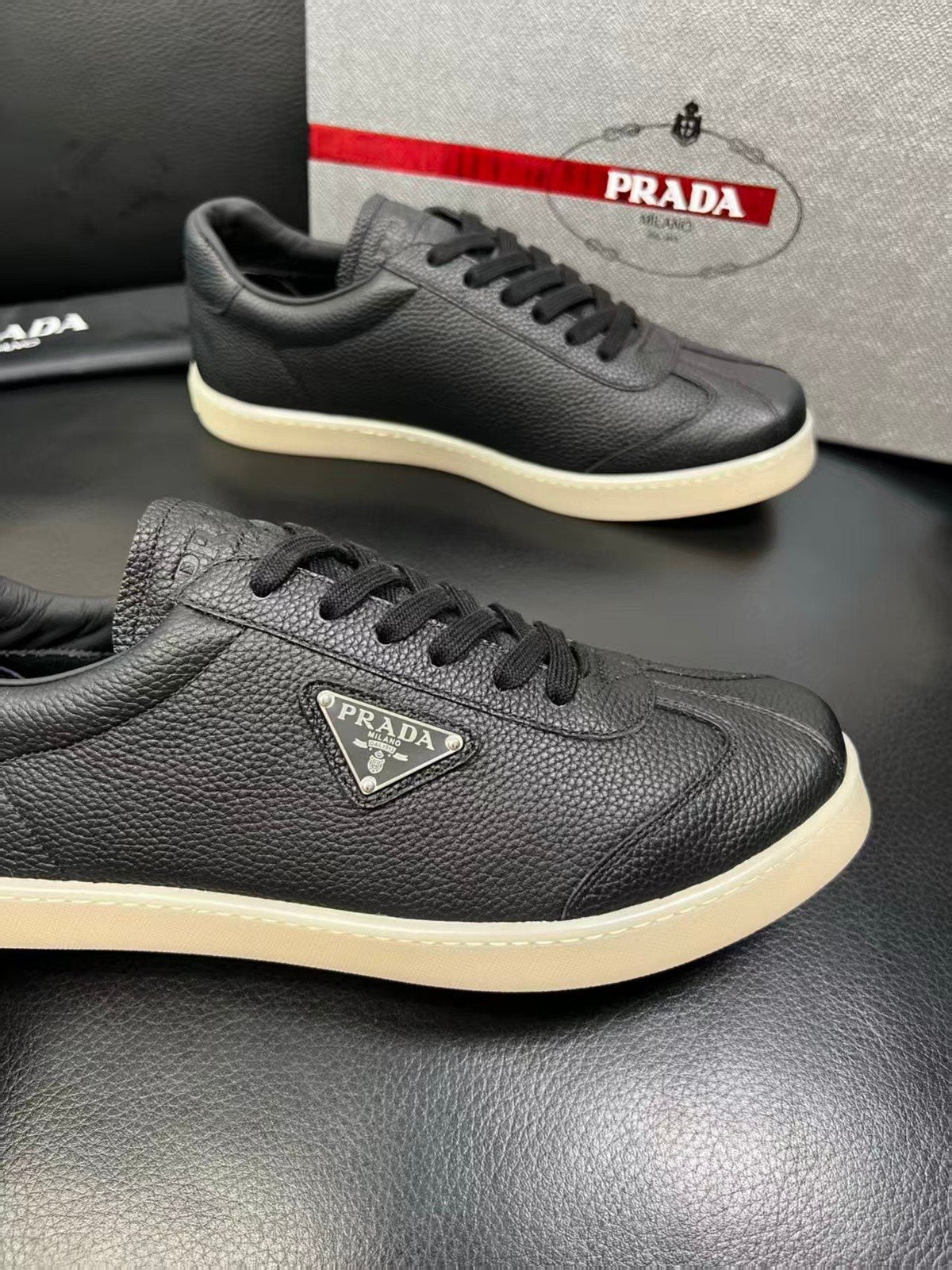 Prada Triangle Logo Low-Top Sneakers — detail