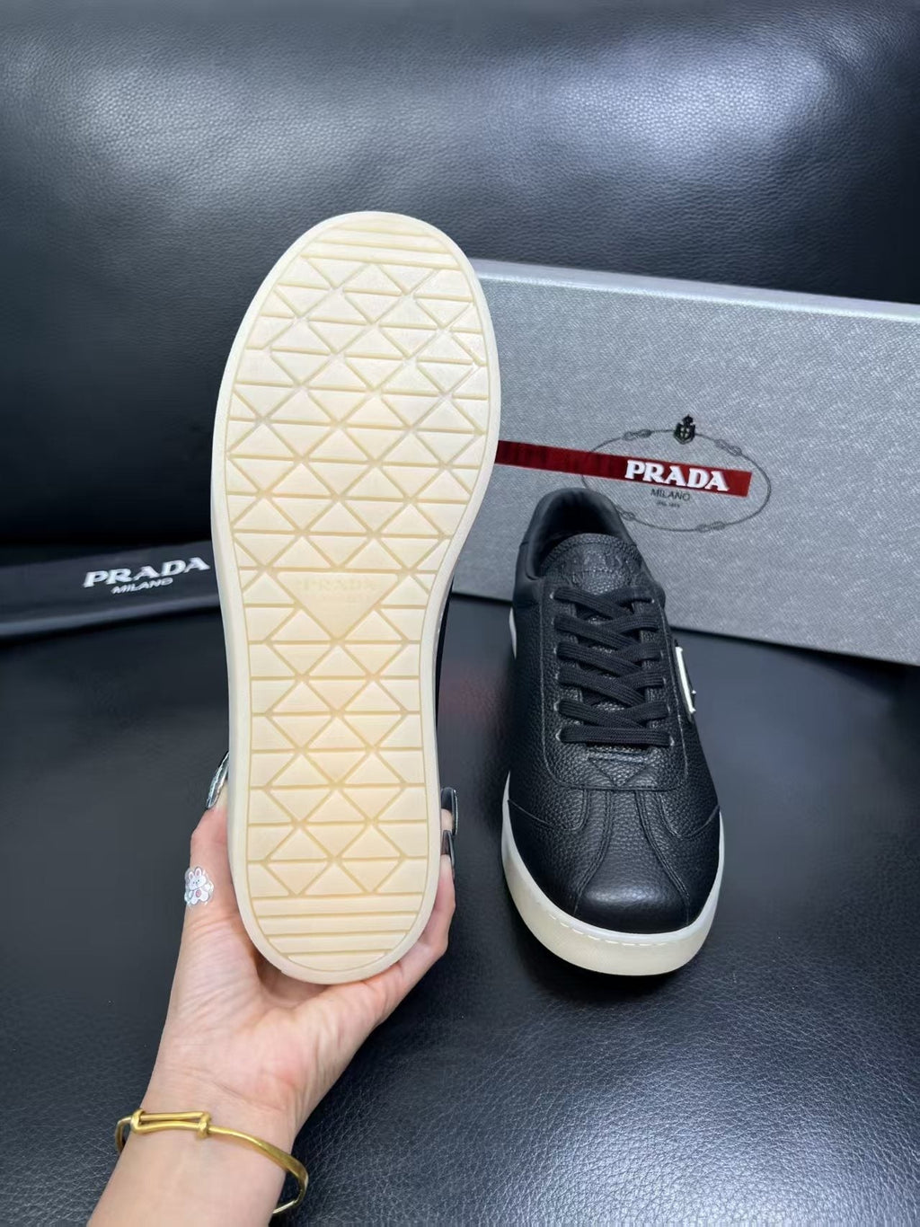 Prada Triangle Logo Low-Top Sneakers — detail