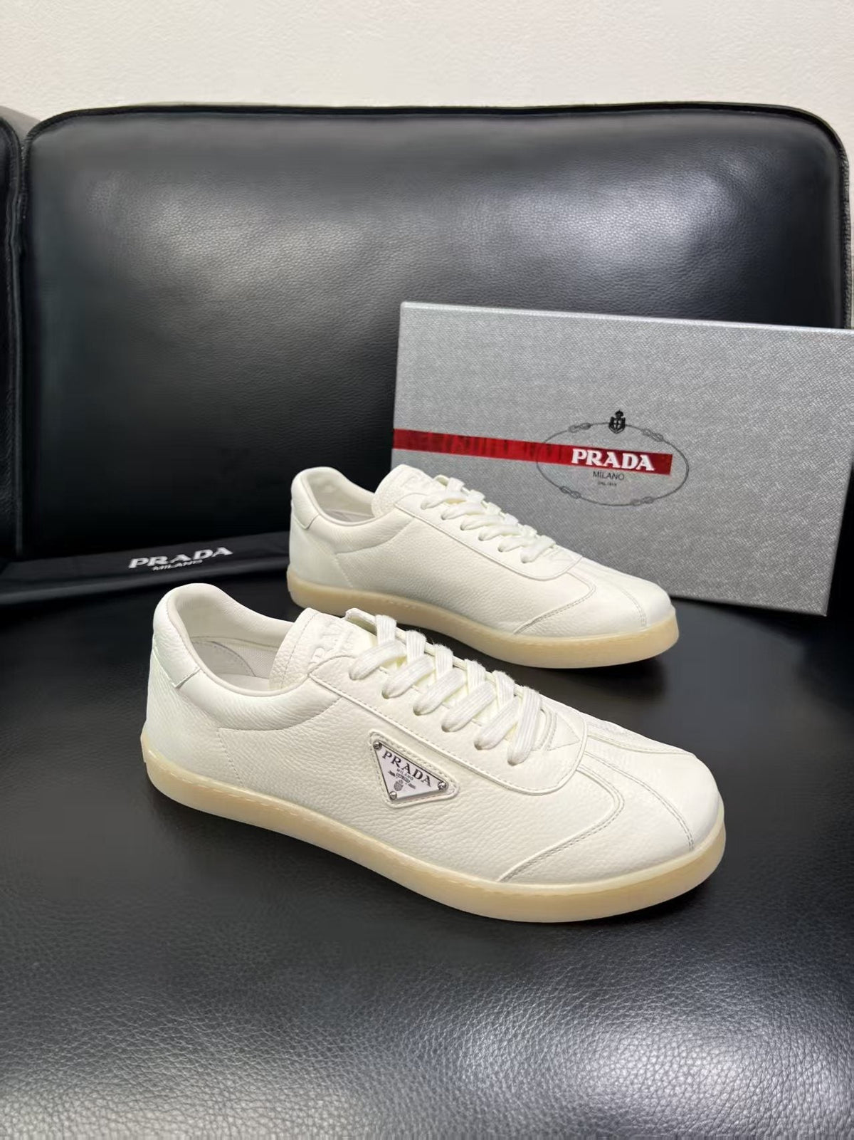 Prada Triangle Logo Low-Top Sneakers — front