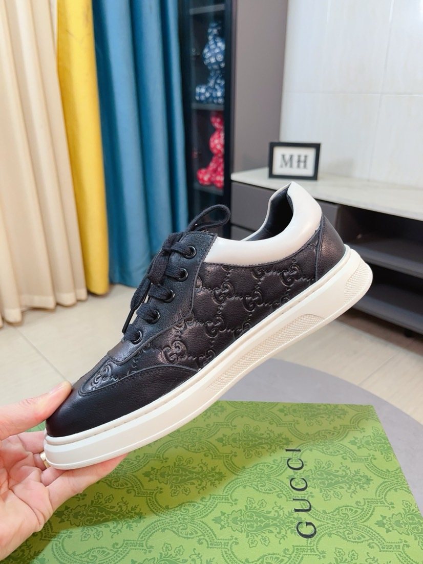 Gucci Embossed Low-Top Sneakers — side