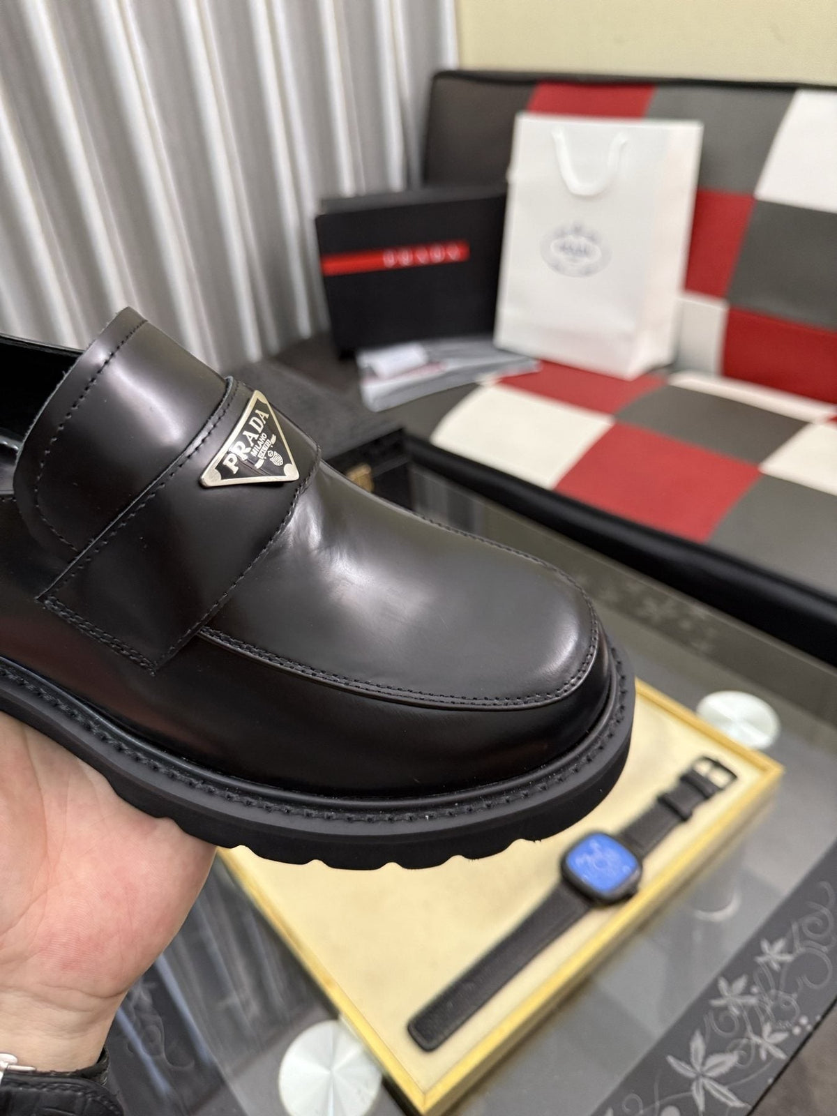 Prada Black Plaque Strap Loafers — model