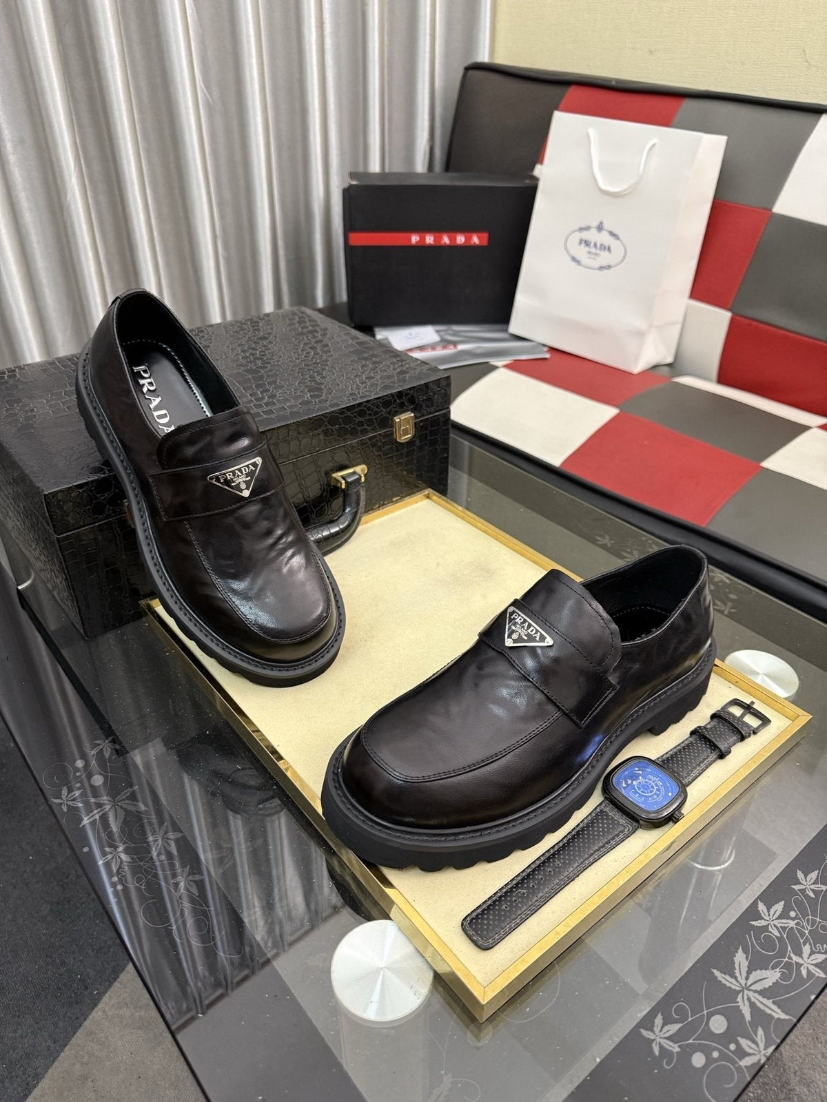 Prada Black Plaque Strap Loafers — model
