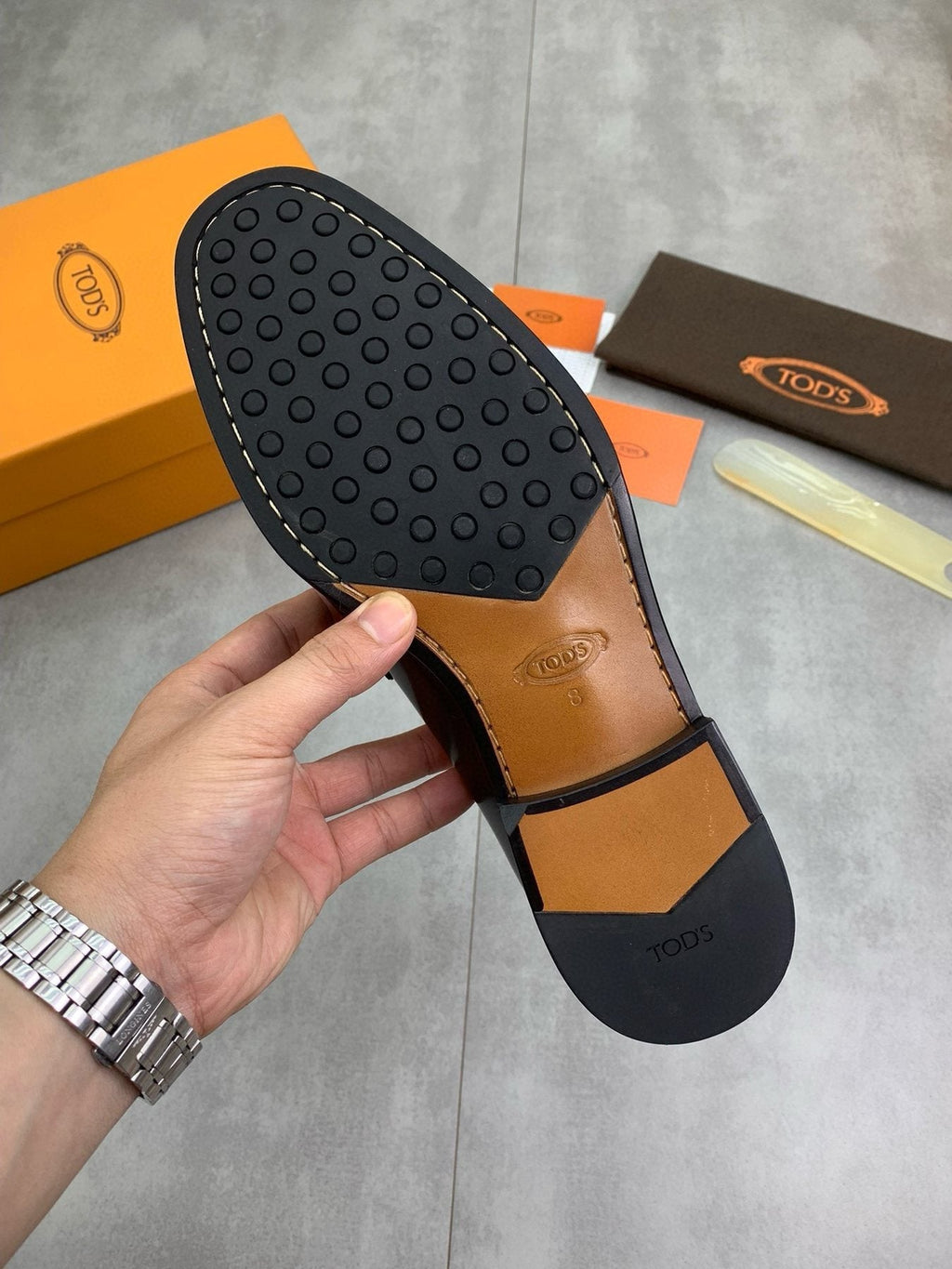 Tod's Black Penny Loafers — detail